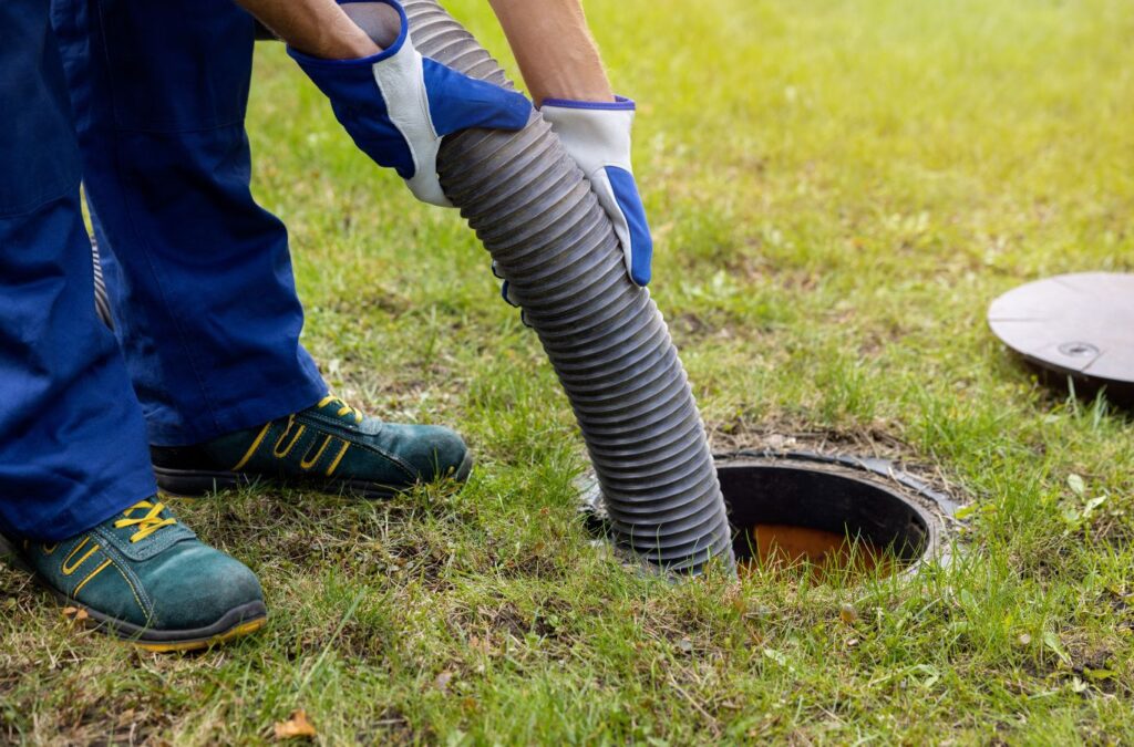 A TAZ Plumbing technician demonstrating efficient sewer drain cleaning in Vail, AZ.